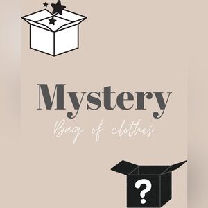 Mystery bag of clothes! Ranging from small to medium sizes!